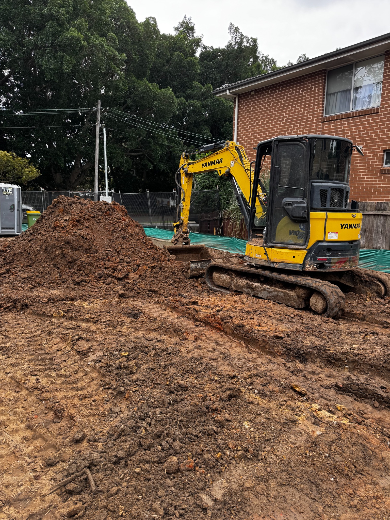 Yanmar 5T excavator carrying out site benching in Strathfield